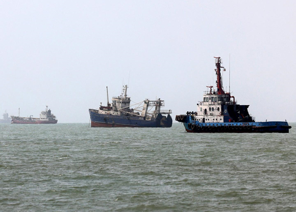 Vessels sit off Bandar Abbas, southern Iran, on the Strait of Hormuz. Source: Reuters